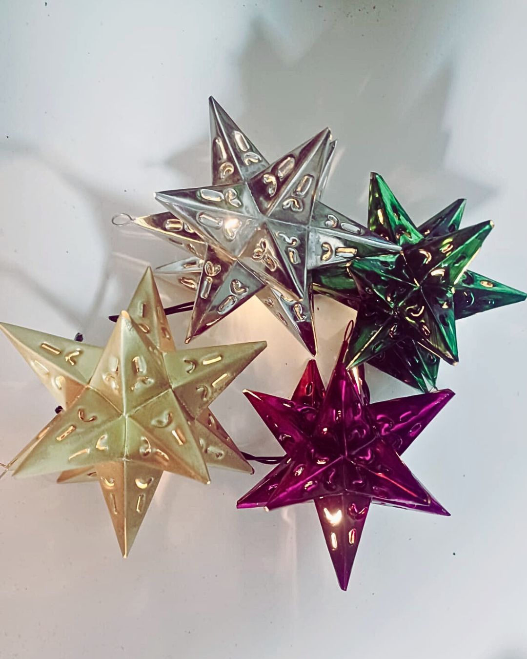 Etoiles en fer blanc pour décorer noël